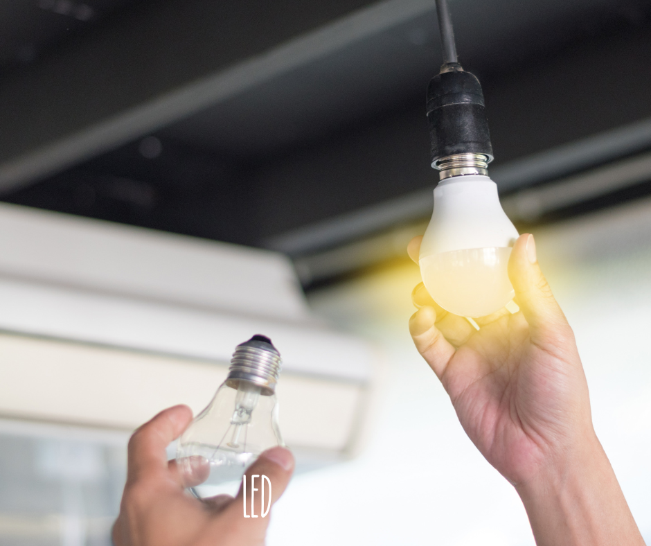 Hand-changing light bulb